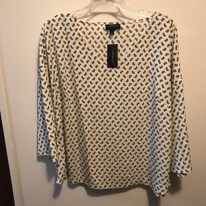 A white printed blouse, new with tag!